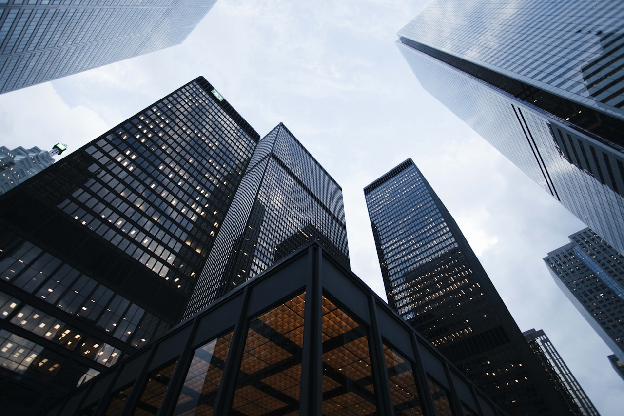Modern office buildings representing financial growth